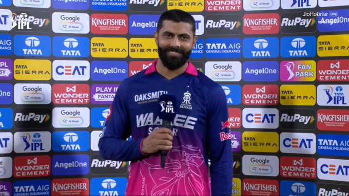 Ravindra Jadeja Says “Pink Looks Good on Me” After Standout Show for Rajasthan Royals

Ravindra Jadeja grabbed attention both on and off the field during today’s IPL 2026 clash, joking that “Pink looks good on me” after delivering a strong performance for Rajasthan Royals.

Facing his former team Chennai Super Kings, Jadeja made an immediate impact with the ball, picking up early wickets and helping restrict CSK to a low total. His disciplined spell played a key role in shifting momentum in Rajasthan’s favor.

The comment, referencing Rajasthan’s iconic pink jersey, quickly went viral among fans, especially given Jadeja’s long association with CSK’s yellow colors. His performance and statement together became one of the talking points of the match.

With both bat and ball contributions expected through the season, Jadeja’s form could be crucial for Rajasthan Royals in their IPL 2026 campaign.

#RavindraJadeja #IPL2026 #RajasthanRoyals #CSK #CricketNews #PinkJersey #IPLUpdates