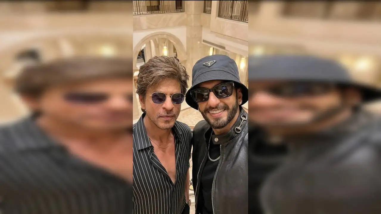 Shah Rukh Khan and Ranveer Singh Put a Hit Twist on Selfie; Check Out the Trending Image

Shah Rukh Khan & Ranveer Singh Selfie Moment Goes Viral After Birthday Party

A recent birthday celebration turned into a viral social media highlight after a selfie featuring Shah Rukh Khan and Ranveer Singh started trending online.

The image shows Ranveer Singh capturing a lively selfie with Shah Rukh Khan, creating a “hit twist” moment that quickly caught the attention of fans across platforms. The duo reportedly attended the star-studded party together just last week.

The unexpected on-camera camaraderie between two of Bollywood’s biggest stars has delighted fans, with the picture going widely viral and sparking excitement on social media.

https://www.zoomtventertainment.com/bollywood/shah-rukh-khan-ranveer-singh-selfie-viral-birthday-bash-article-154006291
#ShahRukhKhan #RanveerSingh #Bollywood #ViralSelfie #TrendingNow #EntertainmentNews