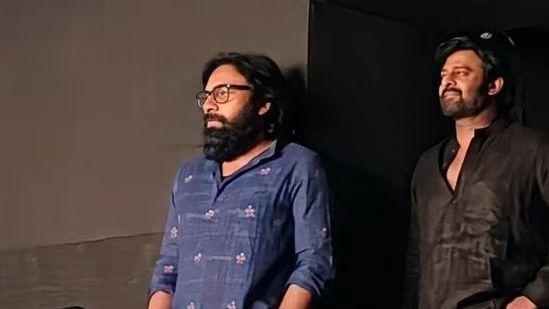 Prabhas and Sandeep Reddy Vanga Take Break from Spirit to Watch Dhurandhar 2 in Hyderabad
Superstar Prabhas and director Sandeep Reddy Vanga were spotted at Allu Cinemas in Hyderabad late Wednesday night, taking a break from their "Spirit" pre-production to watch Ranveer Singh's "Dhurandhar 2: The Revenge."
Dressed casually in all-black and a blue printed kurta respectively, the duo reportedly enjoyed the three-hour-and-forty-nine-minute espionage epic from the premium section of the theater.
According to various reports, the duo’s appearance has sent social media into a frenzy, especially as the film recently surpassed the domestic box office record previously held by Prabhas' own "Baahubali 2." While Sandeep Reddy Vanga had previously praised the first "Dhurandhar" for its "strong masculine spine," fans are now eagerly speculating if the director will draw any stylistic inspiration from Aditya Dhar’s spy franchise for his upcoming project, "Spirit."
#Prabhas #SandeepReddyVanga #Dhurandhar2 #RanveerSingh #Spirit #AlluCinemas #AdityaDhar #HindustanTimes #ZoomTV #DeccanHerald #ETVBharat #IndiaToday #FondPeace